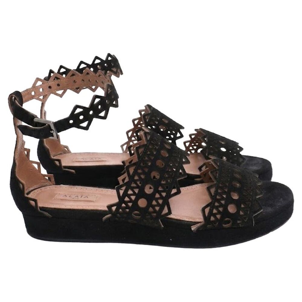Alaïa Laser Cut Open Toe Flat Sandals in Black Suede